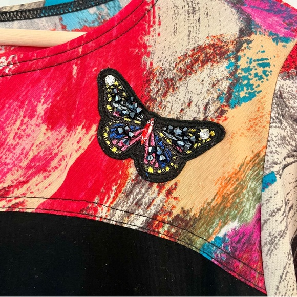 MISCHA Women’s Asymmetrical Blouse Black Multi Colored - Picture 5 of 10